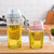 创意厨房用品大容量玻璃防漏调味瓶B816密封透明油壶酱油醋瓶批发(小号粉色)第2张高清大图