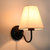 美式复古铁艺壁灯亚麻床头灯卧室客厅书房墙壁灯创意个性酒店房灯(亚麻色灯罩 黑色灯体（带光源）)第2张高清大图