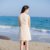 2018夏季新款韩版女装修身显瘦无袖气质娃娃领流苏连衣裙短裙裙子(米白色)(L)第4张高清大图