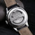 天梭(TISSOT)手表力洛克系列 T006新款80小时全自动机械时尚潮流精男表(银壳白面黑皮带)第4张高清大图