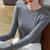 MISS LISA莫代尔t恤时尚圆领薄款长袖打底衫纯色弹力内搭上衣J1D2213(杏色 S)第4张高清大图
