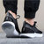 NIKE耐克男子时尚透气舒适运动鞋休闲低帮轻便耐磨缓冲跑步鞋/AQ0067-001(黑白色 45.5)第3张高清大图