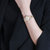 天梭(TISSOT)瑞士手表 海浪系列钢带石英女士手表(T112.210.22.113.01)第4张高清大图