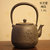 【日本长文堂】日本原装进口关西铁壶手工铸铁壶 煮茶烧水电茶炉 通用无涂层茶壶第4张高清大图
