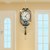 新中式钟表挂钟客厅家用大气挂表新款创意艺术时钟2022挂墙石英钟(20英寸以上 小号：30*74cm【带一个金属置物架】)第2张高清大图