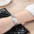 美度(MIDO)手表 都瑞系列时尚优雅石英钢带女士手表M2130.4.26.1(白盘钢带)第5张高清大图