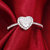 鸣钻国际心形钻戒女 白金求婚钻石戒指 桃心钻石结婚情侣戒指女第4张高清大图