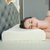天然乳胶枕头一对泰国进口橡胶单人家用双人按摩助睡眠护颈椎枕(默认 颈椎枕（送天丝棉枕套）)第2张高清大图