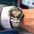 欧美时(OMAYS)新款双面镂空全自动机械男表 轻奢时尚男士手表 夜光防水钨钢表带手表男机械表(白色)第2张高清大图