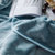 格莉安GELIAN 纯色毛毯法兰绒珊瑚绒毯子居家旅行空调被春秋毯午休毯沙发毯盖毯学生儿童通用(灰蓝)第3张高清大图