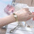 天梭（TISSOT）手表 乐爱系列1853石英小金表  瑞士手表  时尚女士钢带手表(T058.009.33.031.00)第6张高清大图