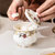 莹辰达骨瓷咖啡杯套装欧式下午茶茶具创意英式咖啡具套装简约家用(16件：1壶 1糖罐 1奶缸 1钢架 6套杯碟 18件)第7张高清大图