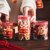 新年春节糖果饼干密封罐曲奇空罐子塑料食品级桶零食盒批发空瓶小(7.5x9cm的圆罐专用红色手提围边10个)第3张高清大图